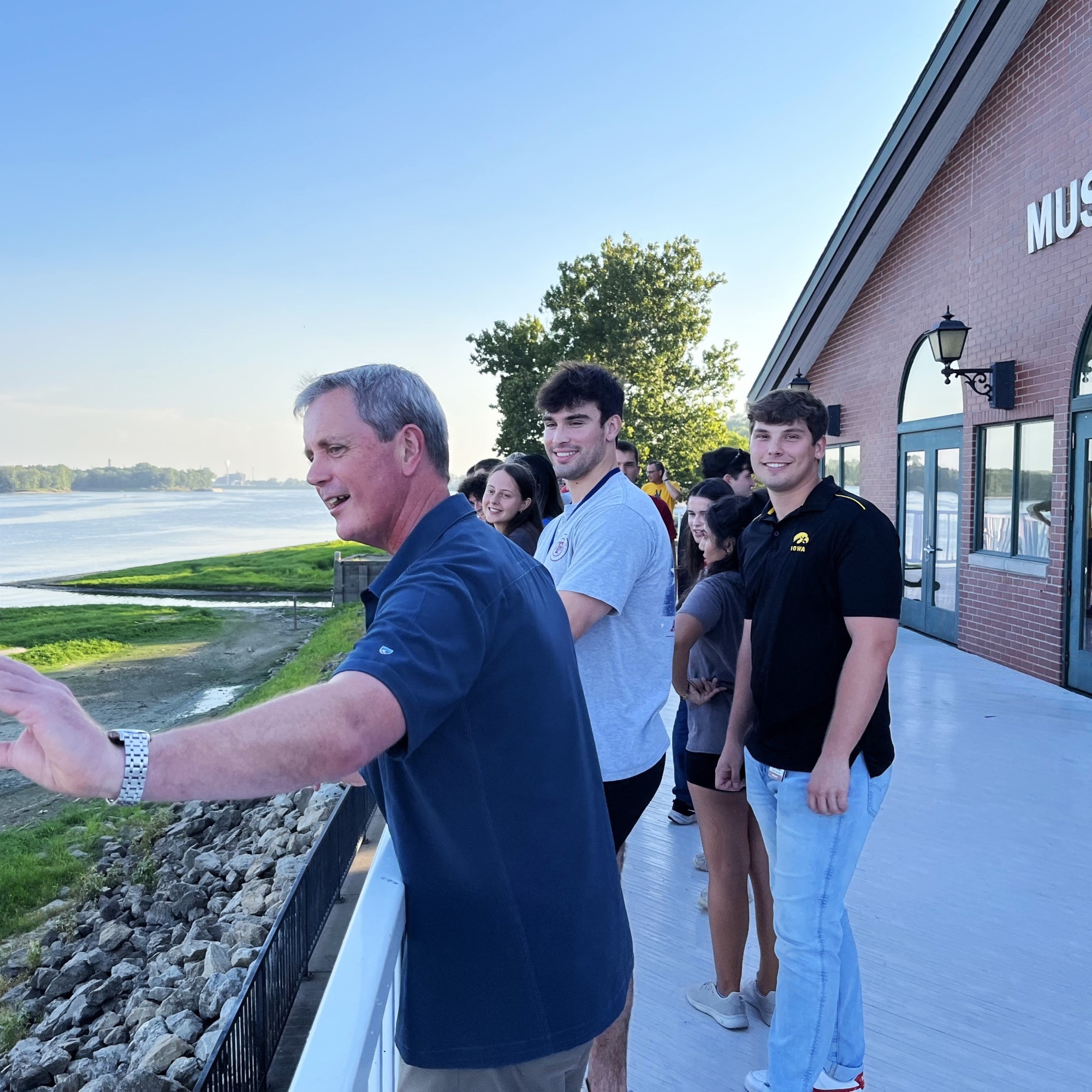 Interns and Group Leader in Muscatine, Iowa During a Trip.