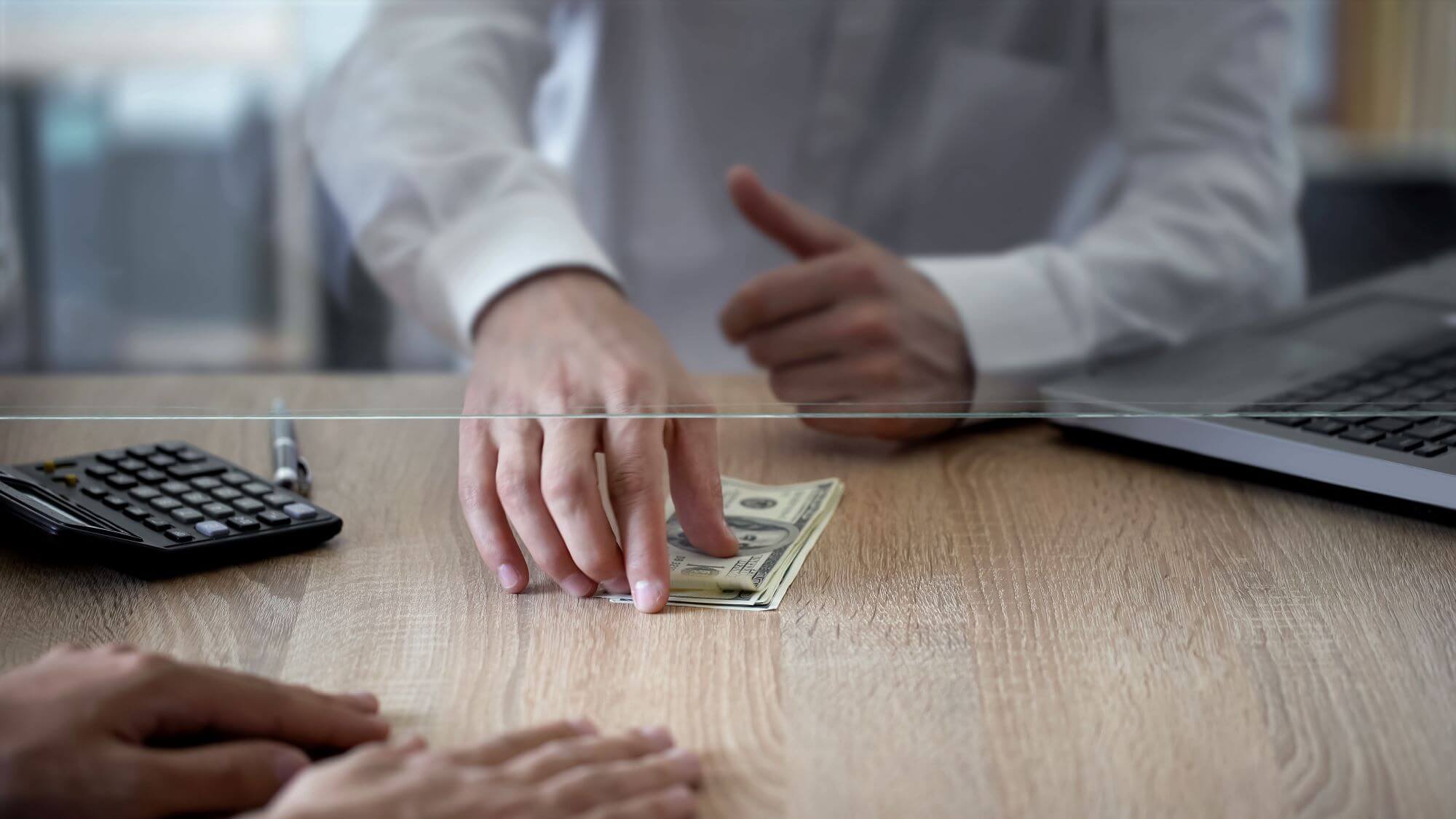 A transaction between two people at a bank