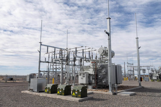 Electrical transformer and switching equipment inside a high-voltage power substation